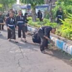 Polres Pasuruan Kota dan Ratusan Pesilat Bersatu dalam Aksi Bersih-Bersih Kota