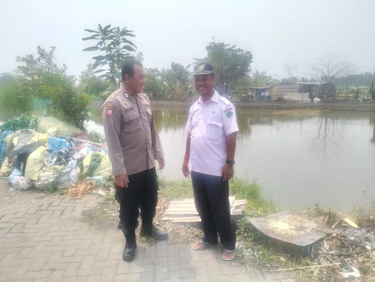 Kolaborasi Polisi dan Warga, Tingkatkan Ketahanan Pangan Melalui Budidaya Ikan Nila 