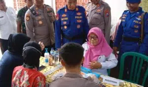 Polresta Sidoarjo Berbagi 100 Paket Sembako Saat Gelar Baktikes Hari Bhayangkara ke-79