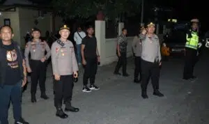 Polres Nganjuk Gelar Patroli SREG dan Penyekatan di Perbatasan Suroan Berjalan Kondusif