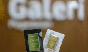 Harga emas Antam turun