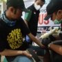 Demi Hijrah Lebih Bersih, Puluhan Warga Antusias Ikuti Hapus Tato Gratis di Sidoarjo