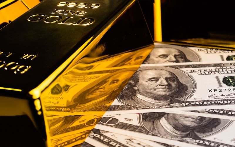 Perkembangan Harga Emas Dunia yang Menurun Drastis di Bawah USD 5.000 per Troy Ons