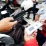 Pemkot Surabaya Perkenalkan Sistem Parkir Non-Tunai dengan Voucher